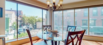 Centrally located open concept apartment with parking, central AC, & W/D