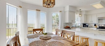 Two-story Gulf view retreat with furnished deck, washer/dryer, central AC