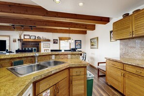 Fridge, microwave, oven, stovetop - Mountain view condo with fireplace, hot tubs, sauna, & easy slope access (Crested Butte)