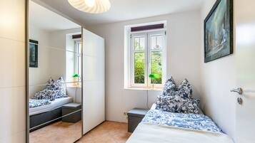 2 habitaciones, tabla de planchar con plancha y wifi gratis