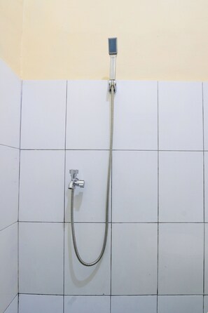 Basic Double Room | Bathroom | Shower, soap - Hotel O Guest House Wijaya Syariah Near alun alun kota purwokerto (Purwokerto)