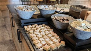 A buffet with various food items including pastries, bread, and beverages. - Hotel Stubai (Schönberg im Stubaital)