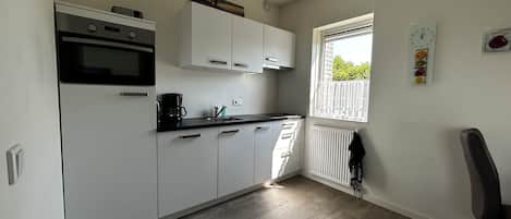 Fridge, microwave, dishwasher, coffee/tea maker