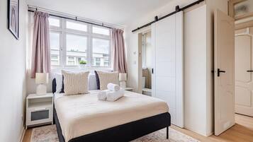 4 bedrooms, desk, iron/ironing board, travel cot