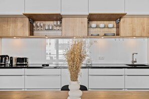 Fridge, microwave, oven, stovetop - Modern 1-BR Apartment with Balcony in Cessange (Luxembourg)