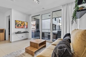 TV - Modern 1-BR Apartment with Balcony in Cessange (Luxembourg)