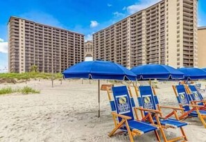 On the beach, sun loungers, beach towels