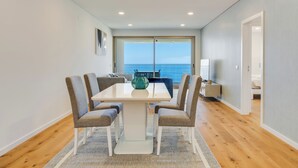 Appartement Luxe, vue océan | Coin séjour