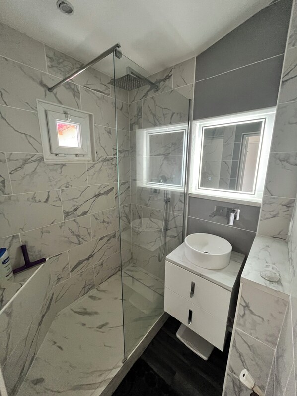 Hair dryer, towels, soap, toilet paper
