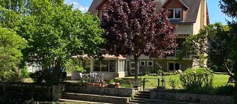 Waterfront Retreat: Spacious 6-Bedroom House with Parking, Modern Amenities, and Veranda for Relaxation