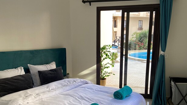 Unclassified image, 1 of 20, button - Chic Stylish Spacious Apt Poolside, Smarttv & Wifi (Hurghada)