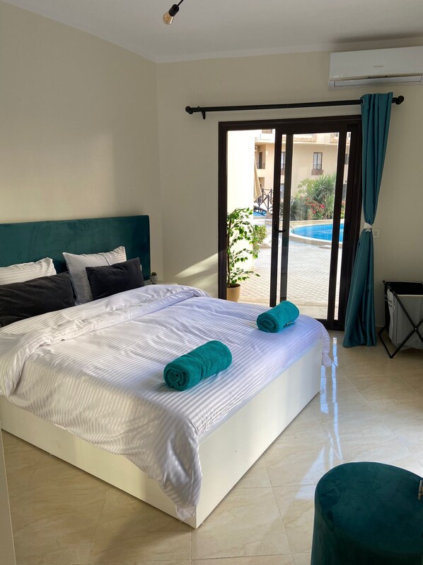 Apartment | 1 bedroom, iron/ironing board, free WiFi, bed sheets - Chic Stylish Spacious Apt Poolside, Smarttv & Wifi (Hurghada)