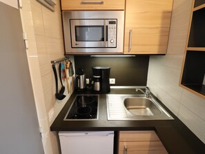 Fridge, microwave, coffee/tea maker, toaster