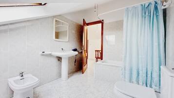 Hair dryer, bidet, towels, soap