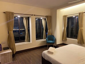 Luxury Room, Private Bathroom, City View | Desk, laptop workspace, blackout curtains, iron/ironing board - The Aster Penthouse (Kolkata)
