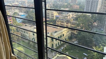 Luxury Room, Private Bathroom, City View | Desk, laptop workspace, blackout curtains, iron/ironing board