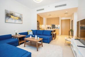 Luxury Apartment, Balcony, City View | Living area | 50-inch Smart TV with cable channels - Tanin - Luxurious 5th Floor Retreat at Summer 3 CreekBeach (Dubai)