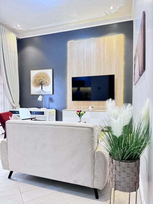 Classic Apartment | Living area - The Croft Homes (Jinja)