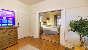 1 bedroom, desk, iron/ironing board, travel cot