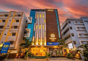 A hotel with a prominent sign for 'Prowell Hotel Crown' and 'Fab Hotels' branding. - FabHotel Prime Prowell Crown (Hyderabad)