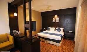 Luxury Suite | Egyptian cotton sheets, premium bedding, in-room safe, free WiFi - FabHotel Prime Bellmont (Noida)