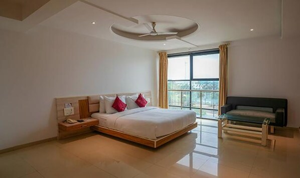 Deluxe Room | Egyptian cotton sheets, premium bedding, in-room safe, free WiFi - FabHotel Prime Rester Select Chakan (Rajgurunagar)