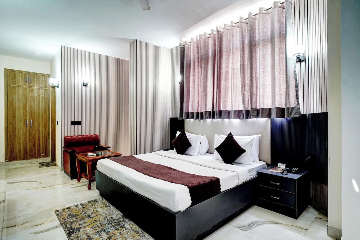 Habitación de lujo | Sábanas de algodón egipcio, ropa de cama de alta calidad, caja fuerte