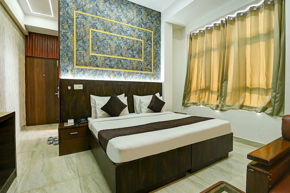 Habitación ejecutiva | Sábanas de algodón egipcio, ropa de cama de alta calidad, caja fuerte