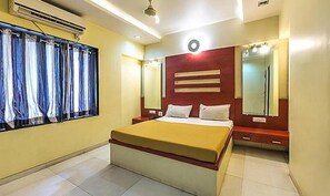 デラックス ルーム | エジプト綿のシーツ、高級寝具、セーフティボックス (室内)、WiFi (無料)