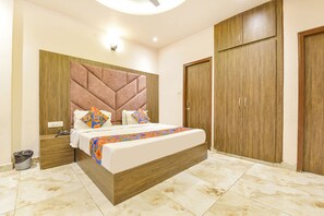 Family Room | Egyptian cotton sheets, premium bedding, in-room safe, free WiFi - FabHotel Dhruv Nanda (Haridwar)