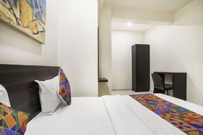 Egyptian cotton sheets, premium bedding, in-room safe, free WiFi - FabHotel SK (Rajkot)