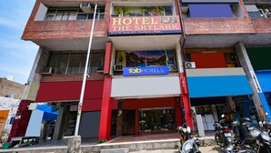 A multi-story building with a sign for "Hotel The Skylark" and "Tab Hotels". - FabExpress Skylark (Chandigarh)