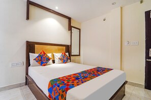 ห้องดีลักซ์ | ผ้าปูที่นอนฝ้ายอียิปต์, เครื่องนอนระดับพรีเมียม, ตู้นิรภัยในห้องพัก