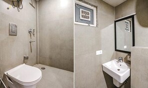 Deluxe Room | Bathroom | Shower, rainfall showerhead, free toiletries, towels