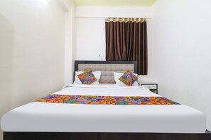 Habitación Deluxe | Sábanas de algodón egipcio y ropa de cama de alta calidad 