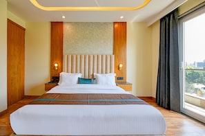 Egyptian cotton sheets, premium bedding, in-room safe, soundproofing - FabHotel Soft Stayz (Gurugram)