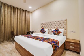Deluxe Room | Egyptian cotton sheets, premium bedding, in-room safe, free WiFi - FabHotel Prime Royals Orchard (Greater Noida)