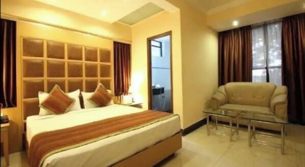 Standard Room Non AC | In-room safe, desk, free WiFi, bed sheets