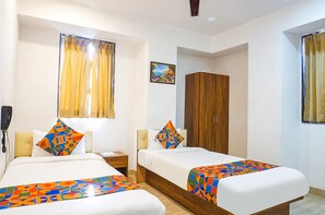 Egyptian cotton sheets, premium bedding, pillowtop beds, in-room safe - FabHotel Atithi Regency (Pune)