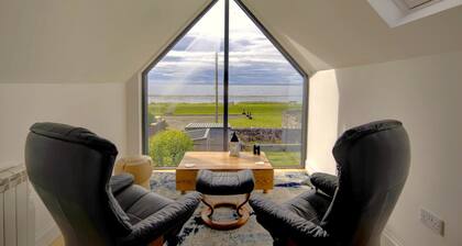 A 3-bedroom beach front house with spectacular views across the Dornoch First.