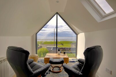 A 3-bedroom beach front house with spectacular views across the Dornoch First.