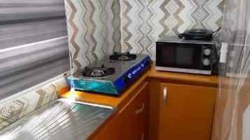 Apartamento | Cozinha privada | Geladeira, micro-ondas, torradeira