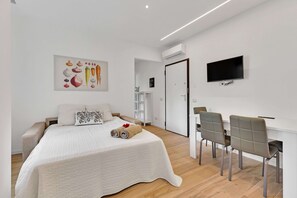 Apartment, 1 King Bed with Sofa bed, Non Smoking | Living area | Flat-screen TV - Alessia's Flat - Bonomelli (Bergamo)