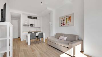 Apartment, 1 King Bed, Non Smoking | Private kitchen | Fridge, microwave, stovetop, cookware/dishes/utensils