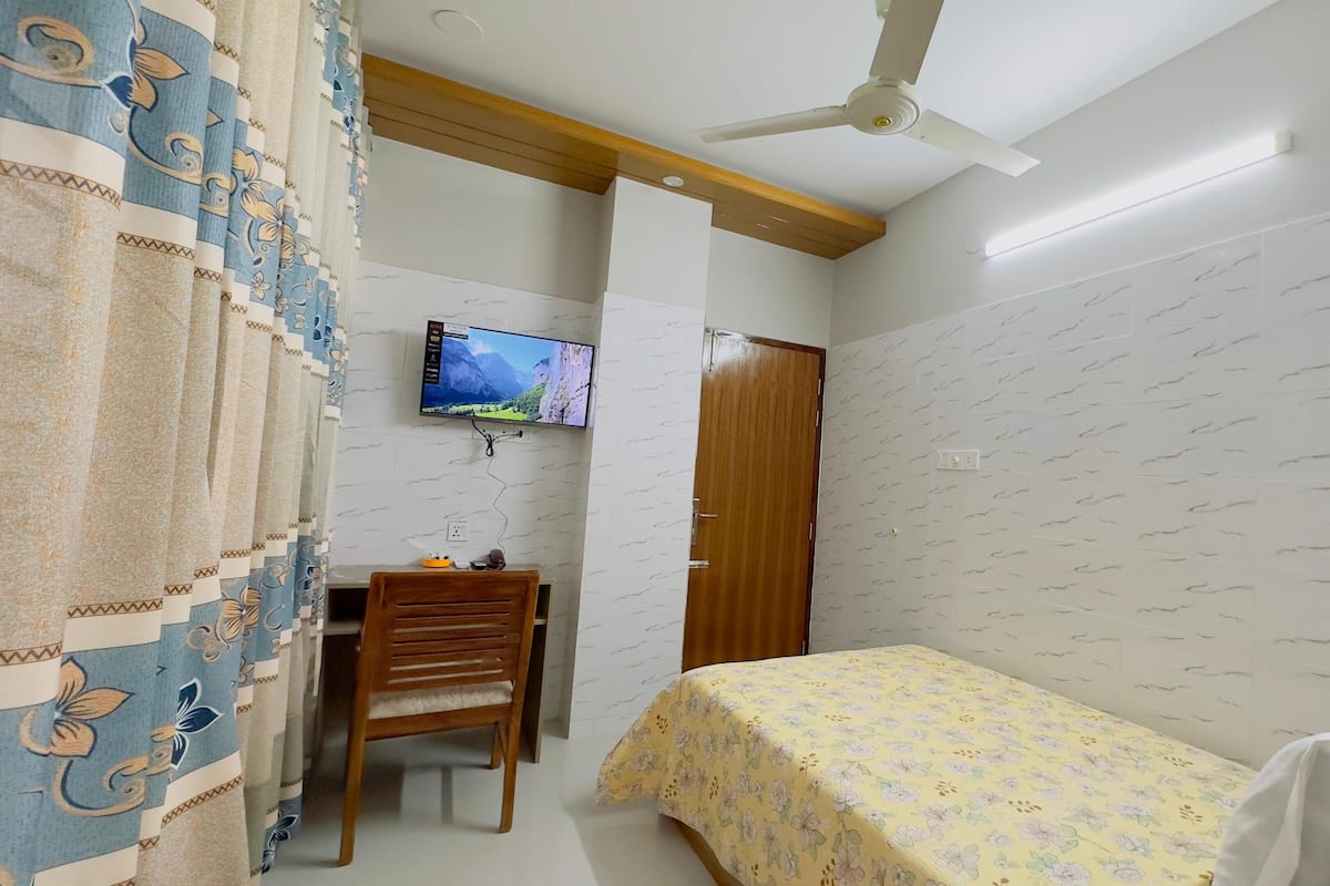 Premium bedding, pillow-top beds, desk, free WiFi