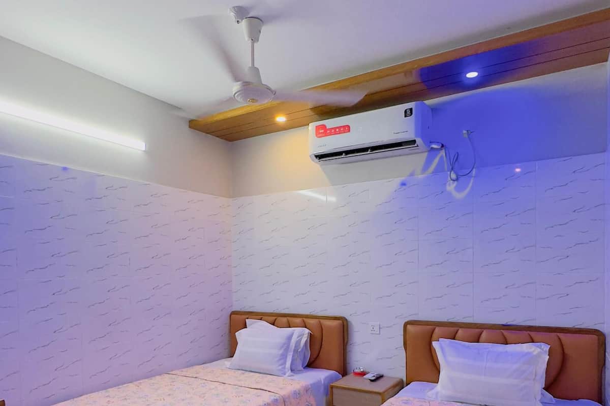 Premium bedding, pillow-top beds, desk, free WiFi