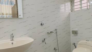 Shower, rainfall showerhead, towels