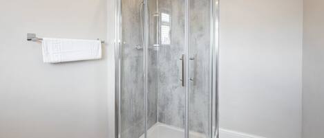 Shower, towels, shampoo