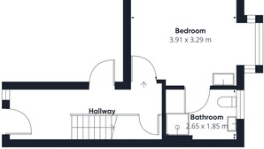 A floor plan of a hotel room layout including a bedroom (3.91 x 3.29 m), a bathroom (2.65 x 1.85 m), and a hallway. - Host & Stay | Clifton Studio 2 (Darlington)