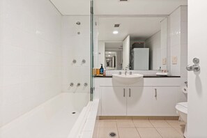 Shower, hair dryer, towels